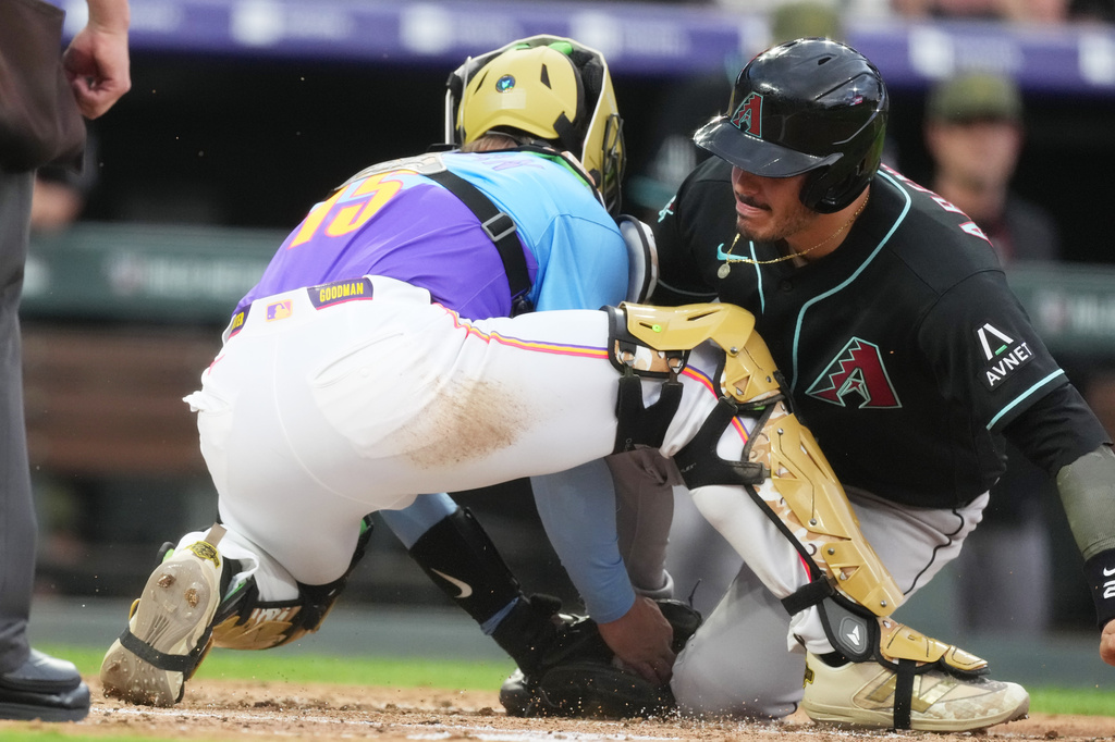 Merrill Kelly throws 1st career complete game, Diamondbacks beat Rockies 9-1