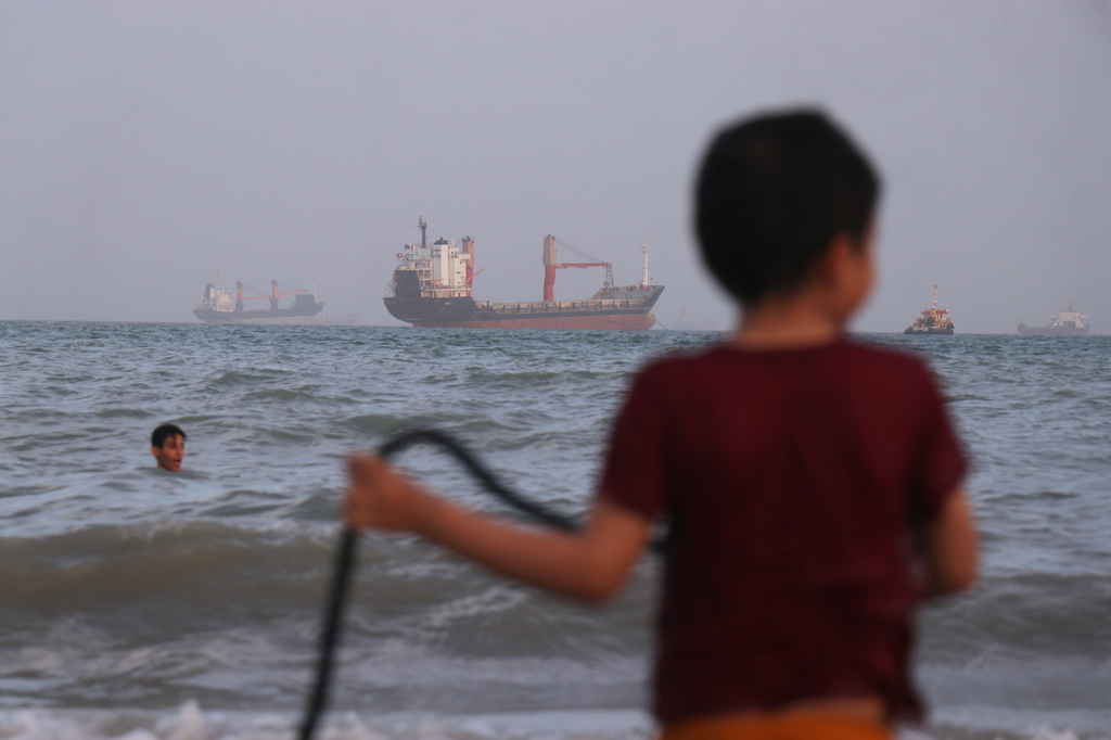 Iran creates new agency to control shipping in Strait of Hormuz while reviewing peace deal with US