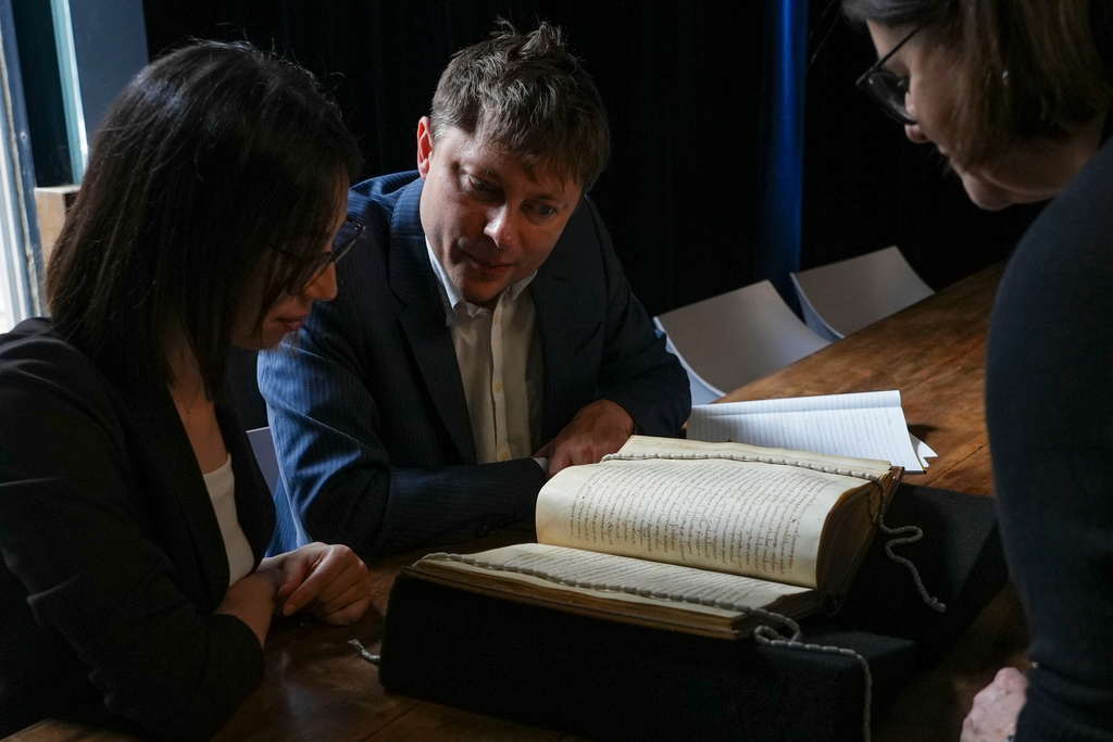 Researchers stunned by a forgotten medieval book in Rome hiding the oldest English poem