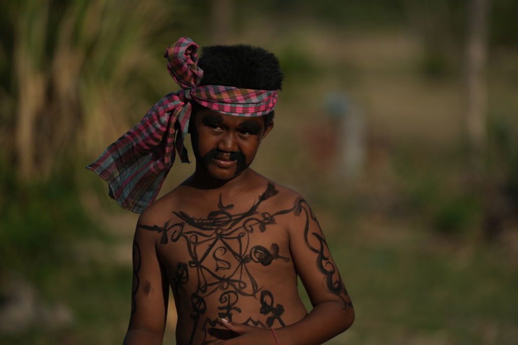 Cambodian villagers honor guardian spirits to pray for rain and good fortune