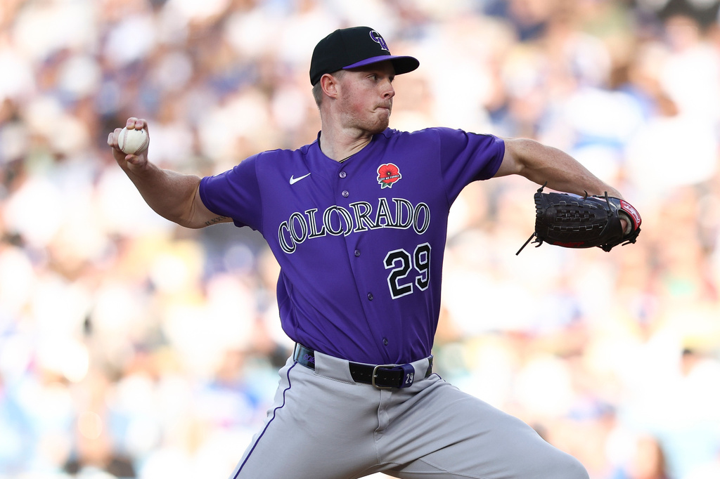 Freddie Freeman sparks a 4-run seventh as the Dodgers rally past the Rockies 5-3