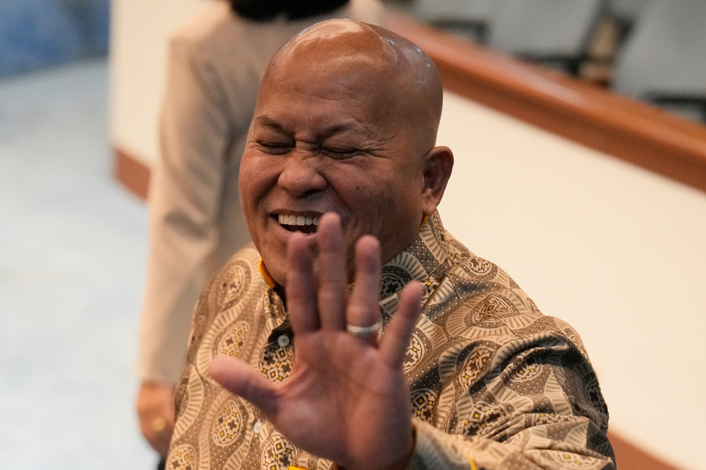 Gunfire breaks out in Philippine Senate where authorities have tried to arrest a senator