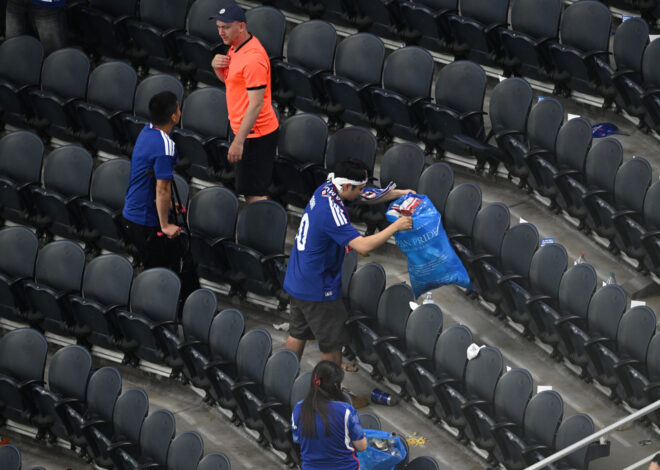 Japan fans use blue bags to uphold a cleansing World Cup tradition after draw
