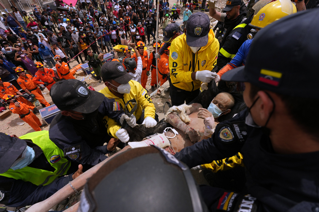 Grief and optimism clash in scramble to locate survivors 4 days after Venezuela earthquakes