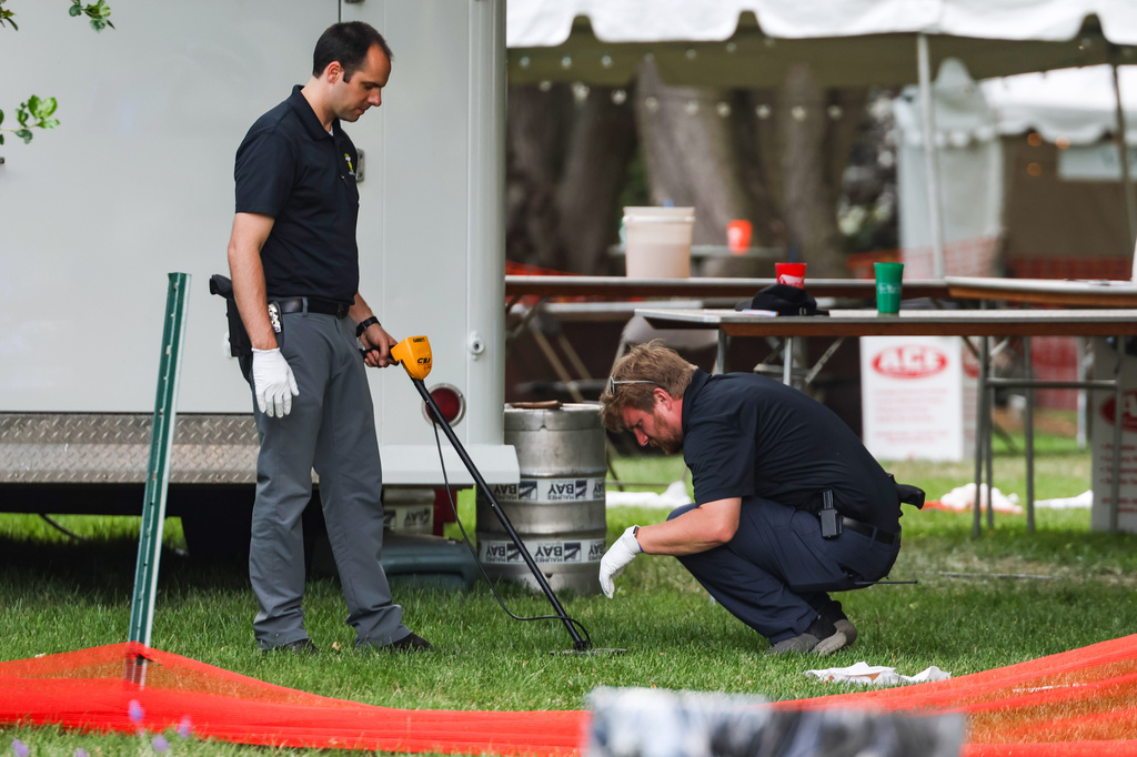 Police search for suspects in Ohio shooting that wounded 12 near a street festival