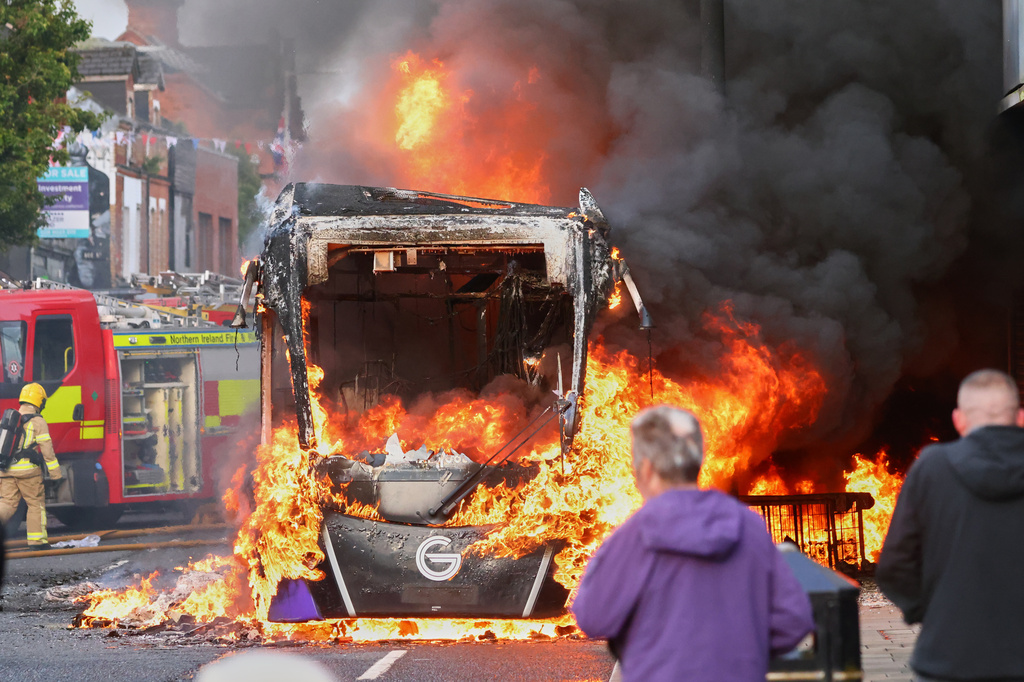 UK leaders call for calm as protests break out after Belfast street stabbing