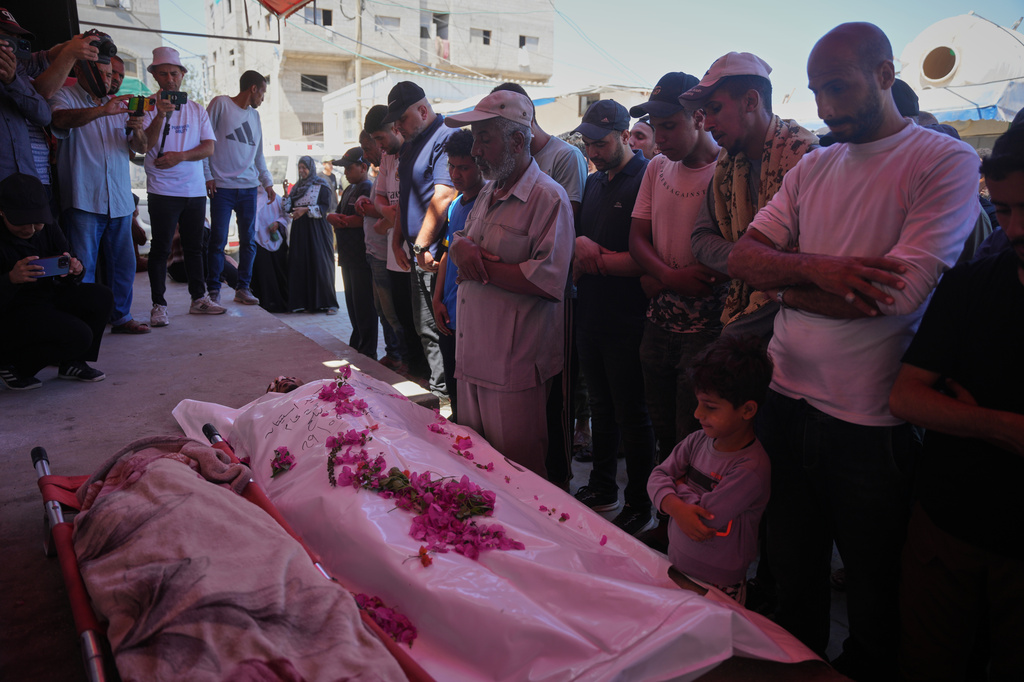 Israeli strike hits a tent in central Gaza, killing 3, including a child