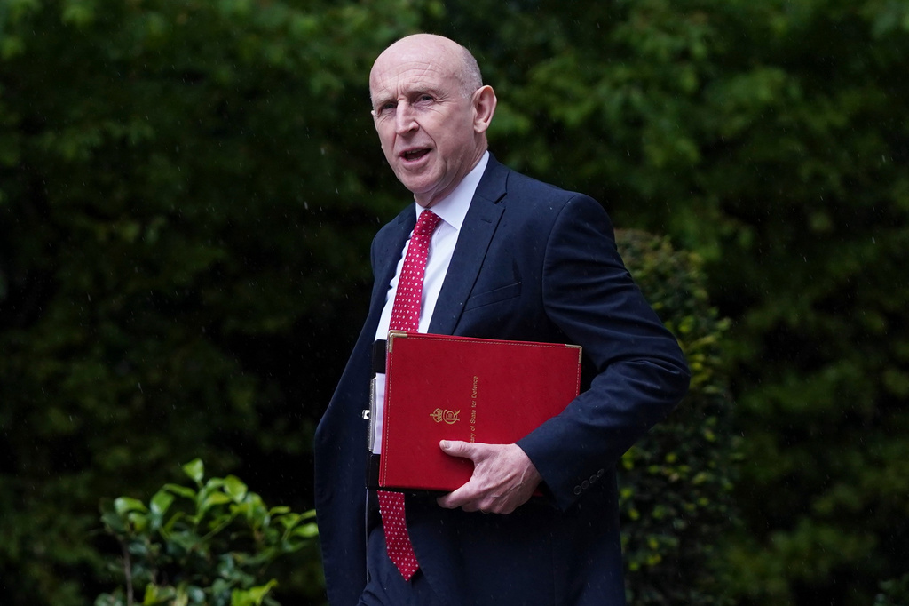 UK defense secretary resigns, saying the government is not willing to spend enough on the military