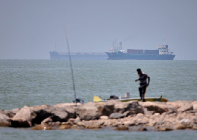 Iranian drones attack Bahrain and a ship is struck in the strait after US airstrikes