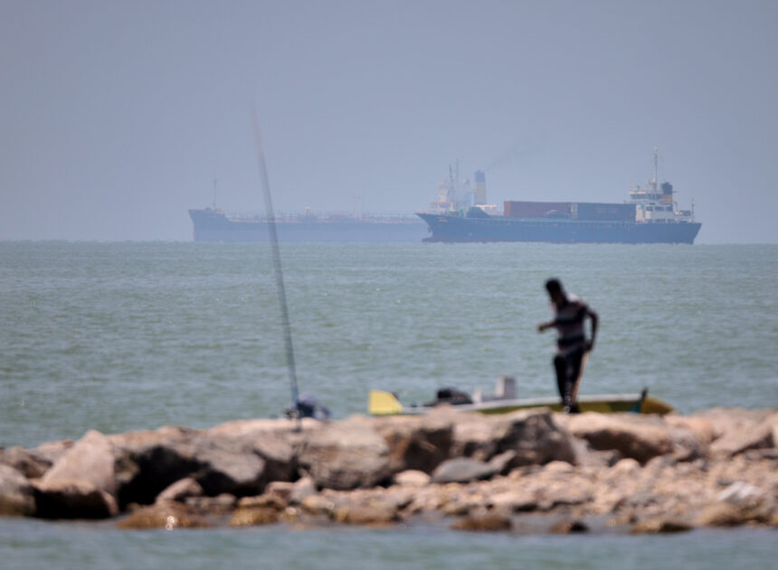 Iranian drones attack Bahrain and a ship is struck in the strait after US airstrikes