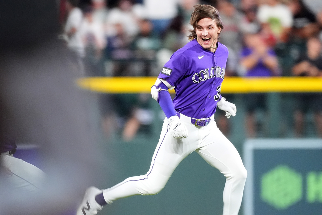 Jake McCarthy hits 3-run triple in 9th inning as Rockies rally for 3-2 win over Red Sox