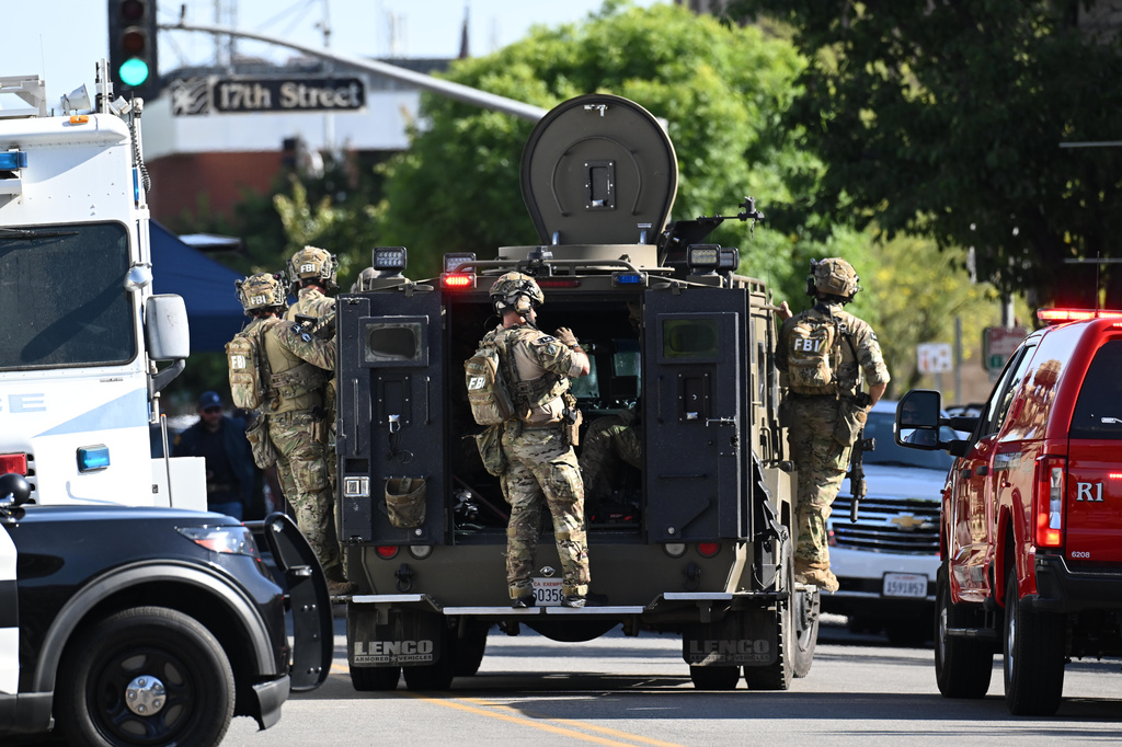 Suspect who took 10 people hostage in California standoff has been shot and killed, police say
