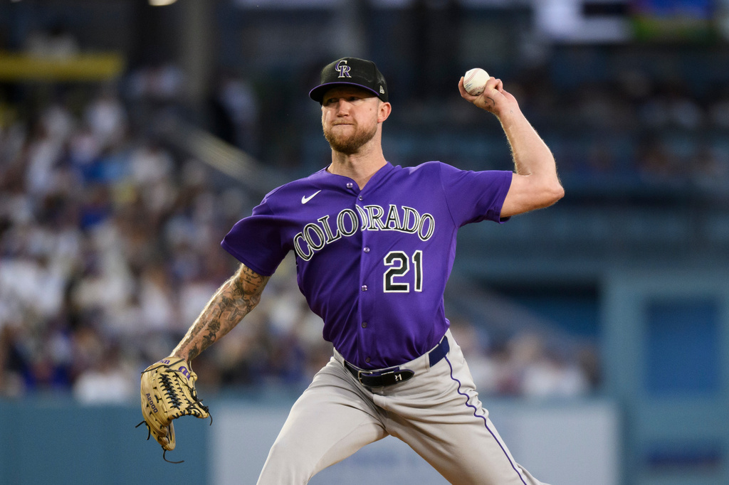 Rushing delivers a dramatic 11th-inning walk-off as Dodgers edge Rockies 8-7