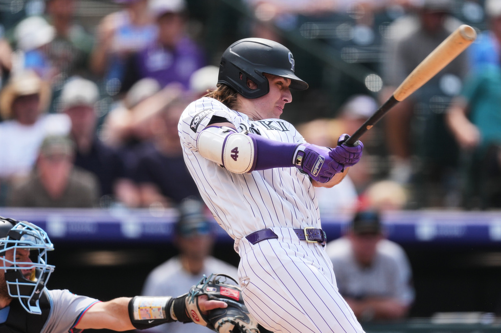 Rockies erupt for 14-4 win over the Marlins, fueled by a 7-run sixth