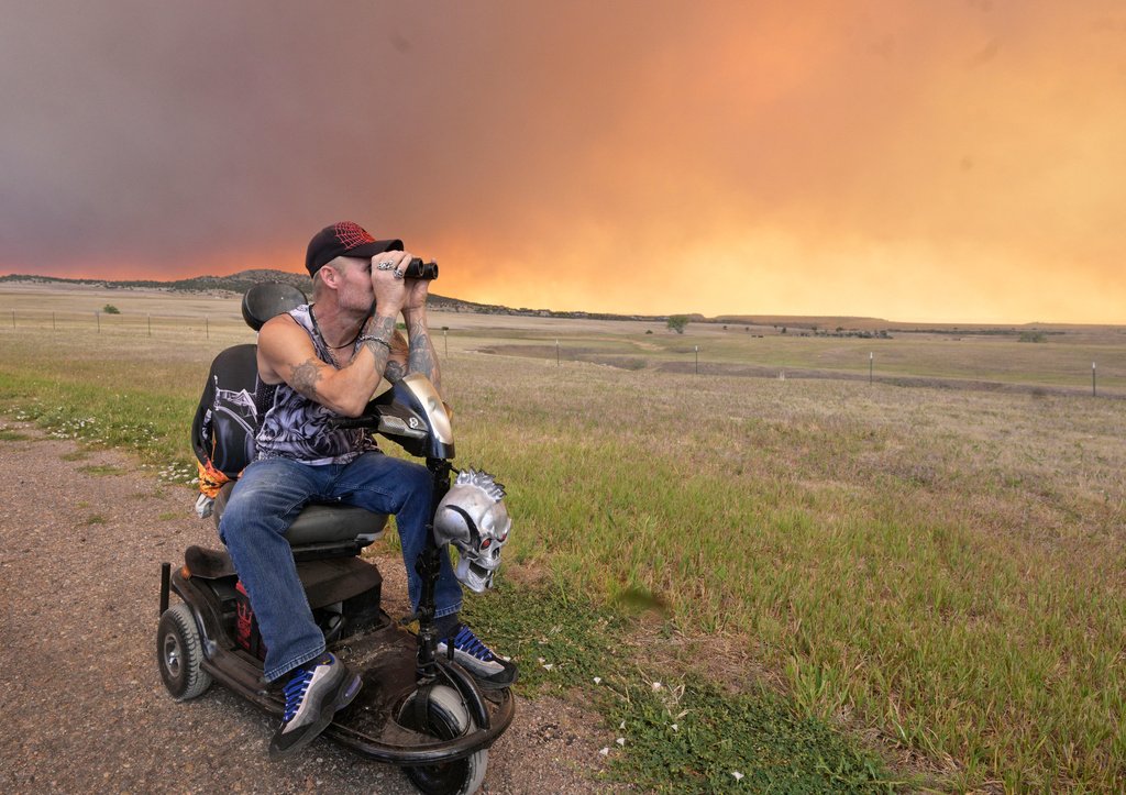 Wildfire anxiety mounts amid fast-moving blazes and repeat evacuations in Colorado, the West