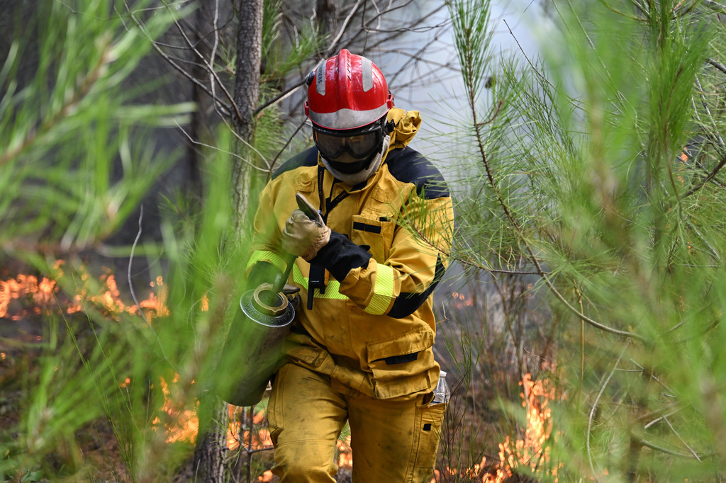 As France tames wildfire and lets 84,000 evacuees go home, blazes flare across Europe