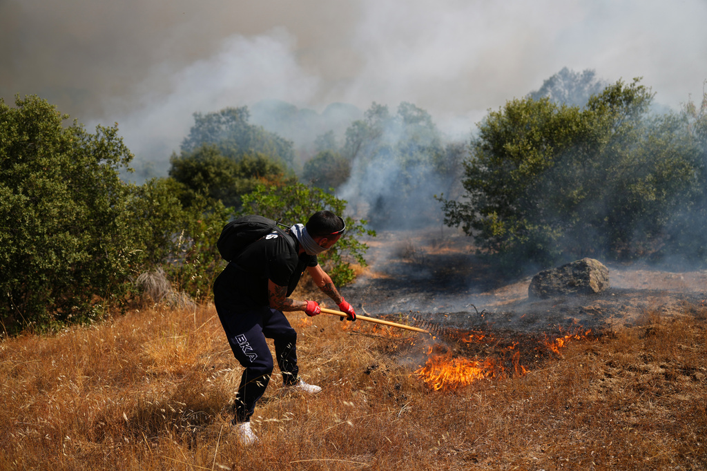 Wildfires in France drive 250,000 people from their homes and creep toward wine city of Bordeaux