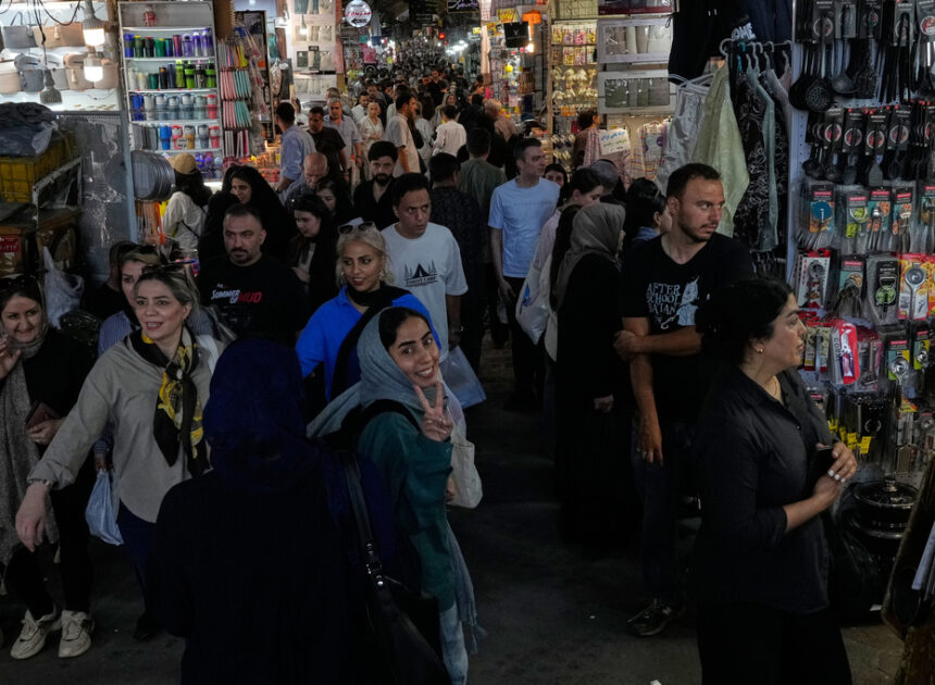 US strikes bridges and collapses a tower at a key port as its Iran campaign expands