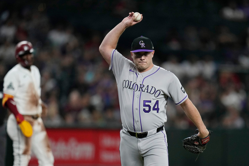 Dodgers acquire reliever Seth Halvorsen from the Rockies for two minor league players