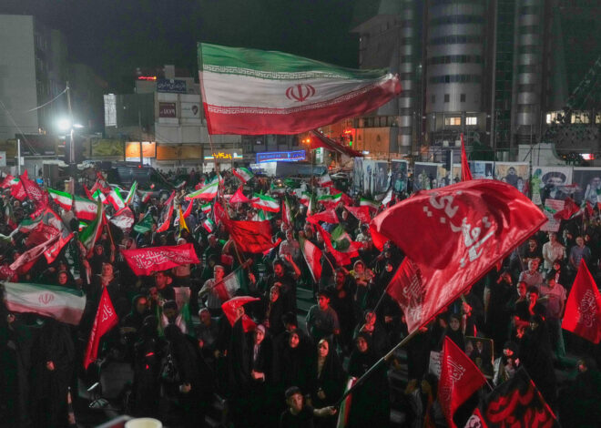 Iran says it is suspending commitments to interim deal with US as they exchange attacks