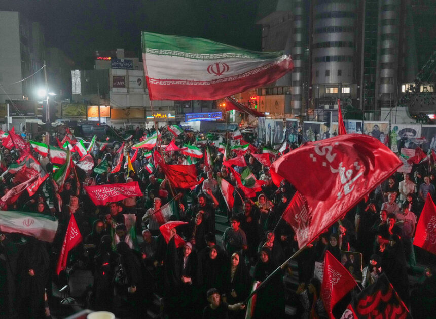 Iran says it is suspending commitments to interim deal with US as they exchange attacks