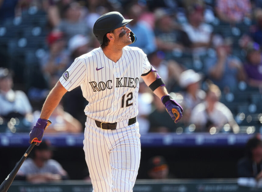 Kyle Karros hits a 3-run homer in the 8th to lift the Rockies past the Giants, 7-6