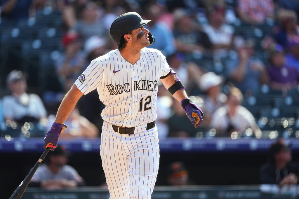 Kyle Karros hits a 3-run homer in the 8th to lift the Rockies past the Giants, 7-6