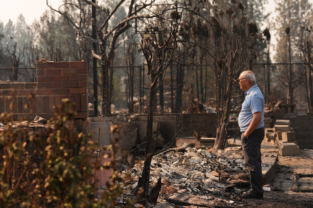 Arson suspect arrested as Spokane battles devastating wildfires
