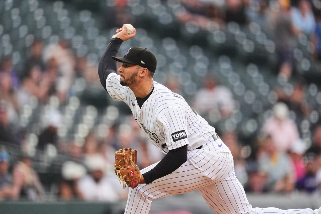 Peralta roughed up in Rays debut but Hicks hits grand slam and Tampa Bay rallies past Rockies in 11