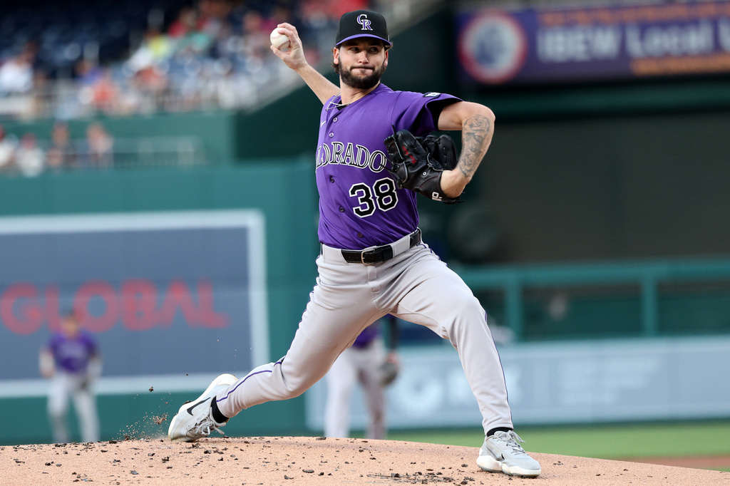Goodman hits 35th homer in his return to the lineup as Rockies snap skid with 3-1 win over Nationals