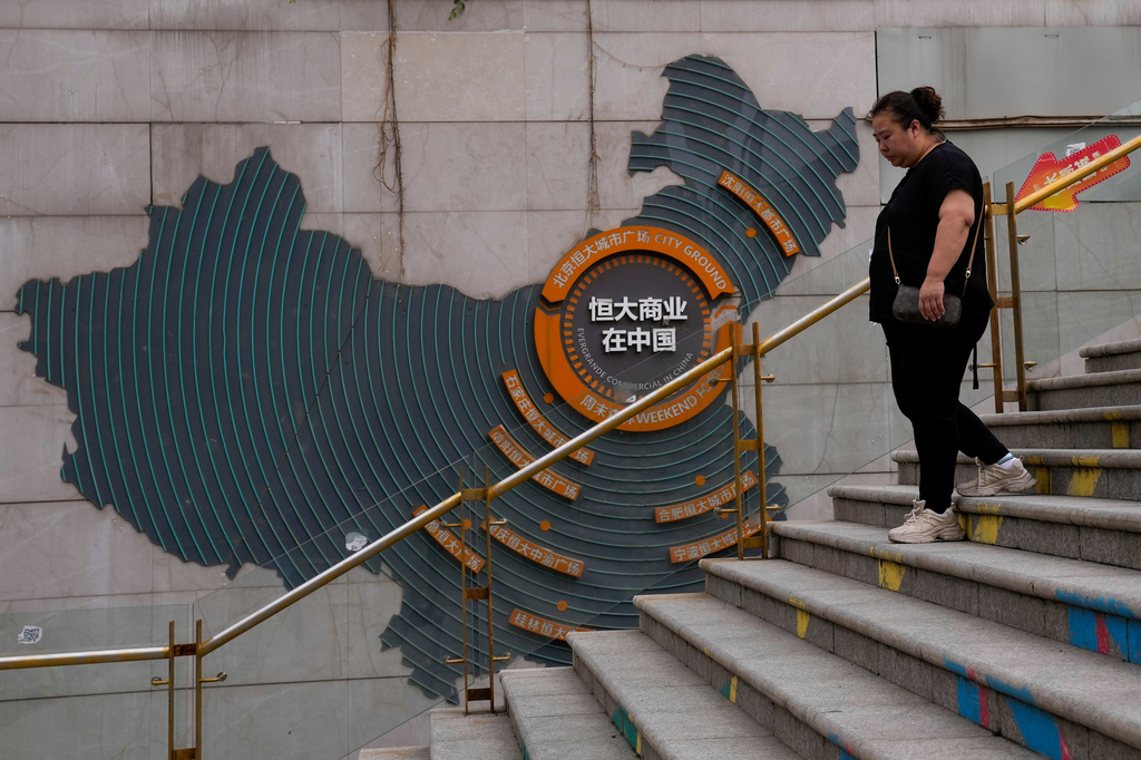 Chinese court sentences founder of troubled property developer Evergrande to life in prison