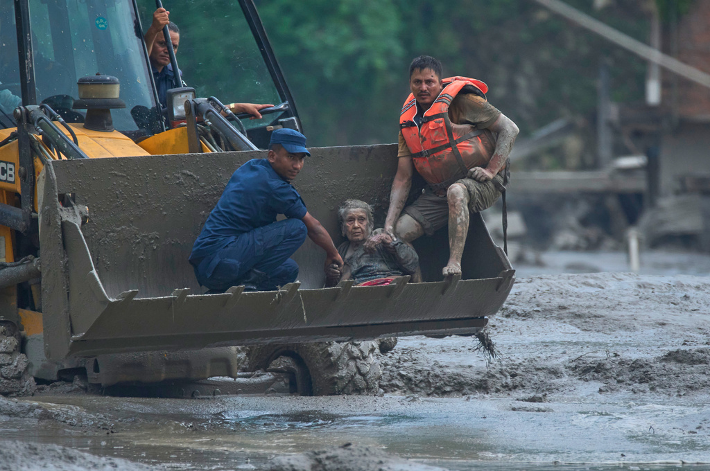 Catastrophic floods kill over 353 in Nepal and Tibet, with more than 1,300 missing