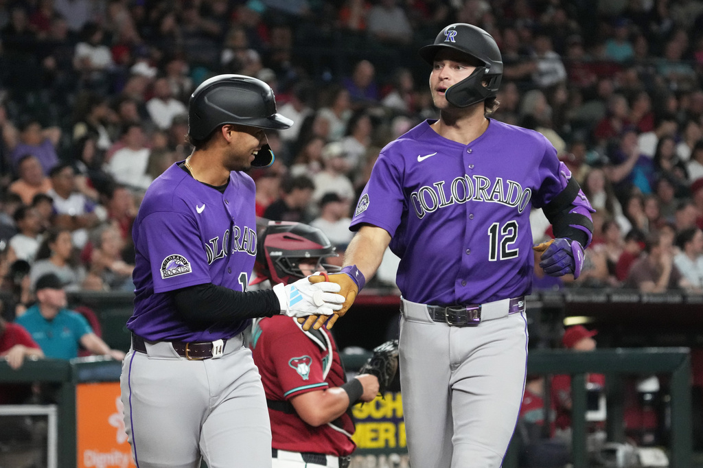 Karros hits 2-run homer before leaving after collision, Rockies rally past Diamondbacks for 3-2 win