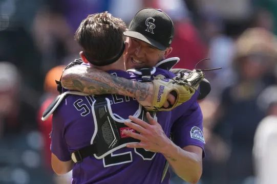 Native son Freeland dazzles in a complete game as Rockies sweep Royals 8-1 at steamy Coors Field