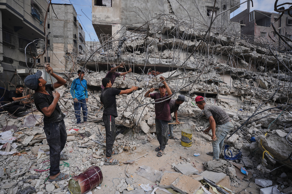 Top US commander visits aircraft carrier, Gaza talks in Egypt and other Mideast news